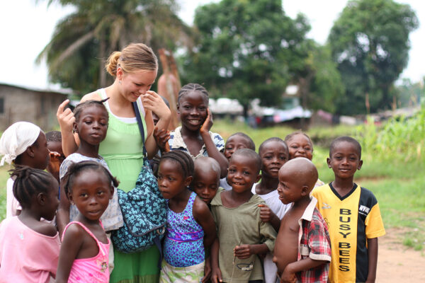 "Sinkor, Liberia - July 2, 2009. A young American missionary lady interacting with the children of this suburb of the capital city, Monrovia."