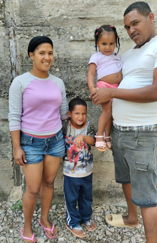 young future engineer and family in the DR