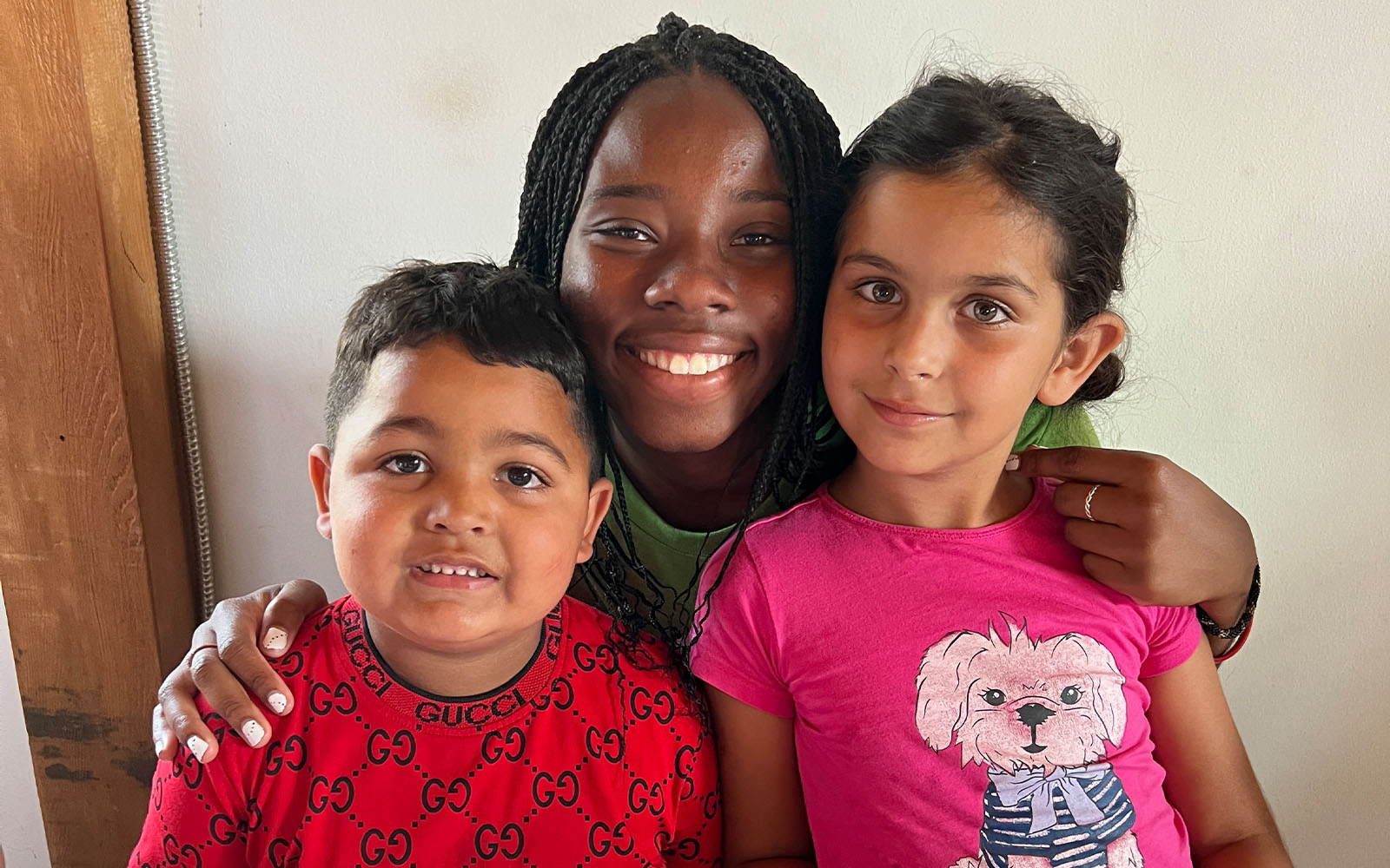 two children in Romania with mission trip participant