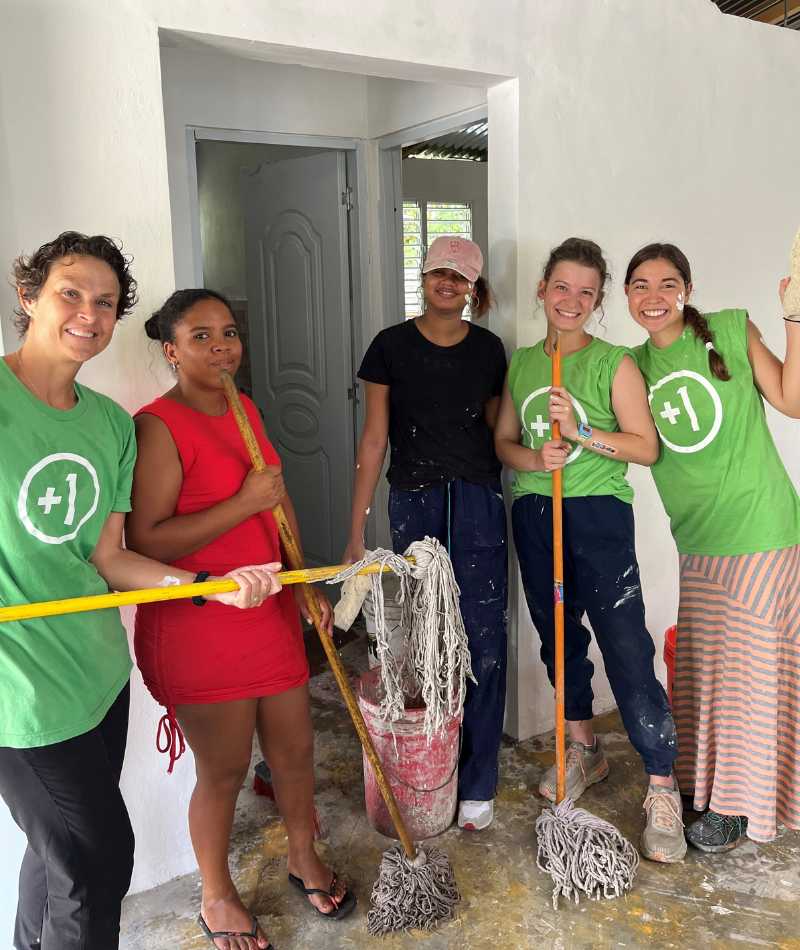 group of women cleaning house from construction