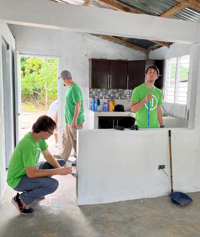 group completing construction work in Dominican