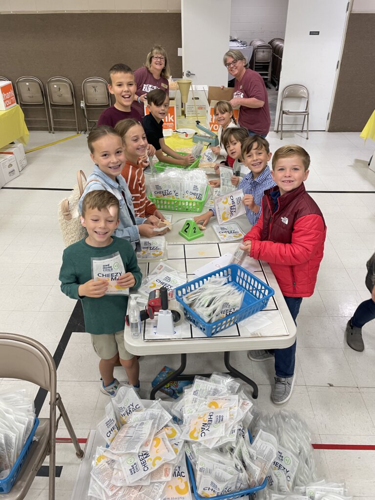 local church meal packing includes children