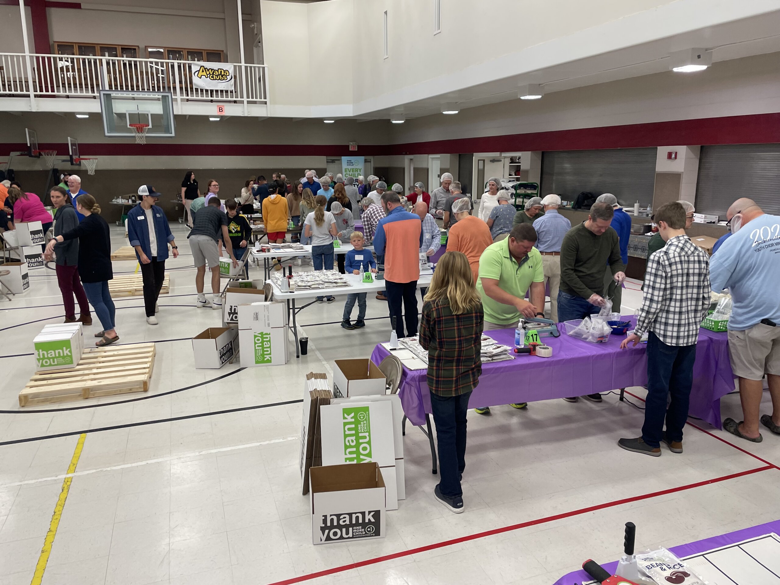 Local Church Packs Meals to Feed Thousands