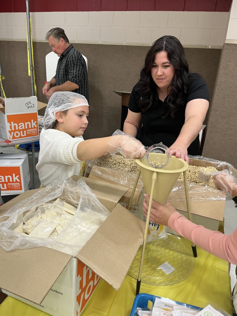 local church meal packing community service