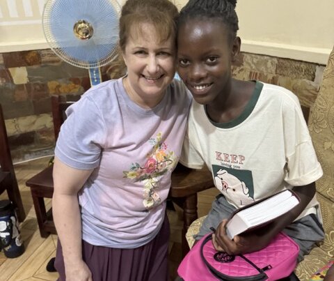 sponsor with sponsored girl in Uganda during mission trip