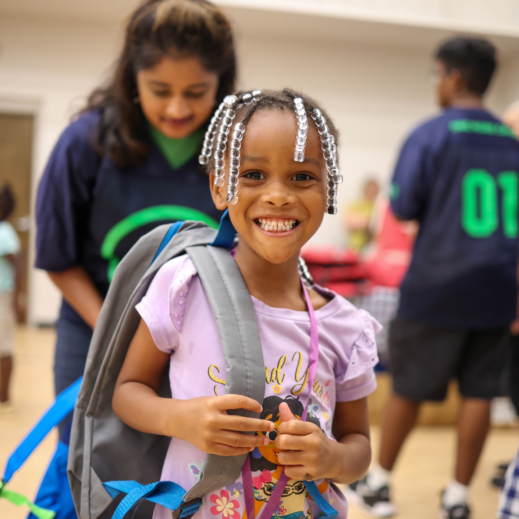 One More Child Partners with Bealls to Distribute Backpacks to Children Returning to School