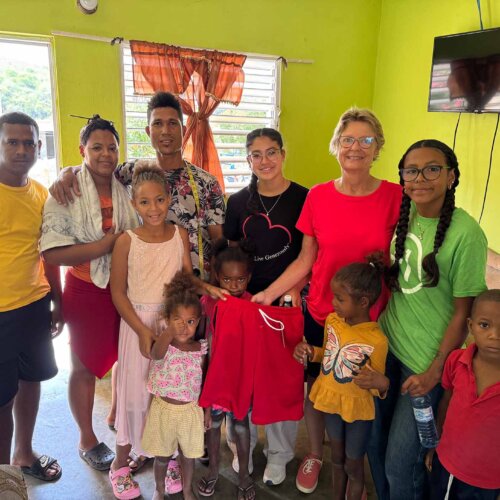 home visit on mission trip with One More Child to DR