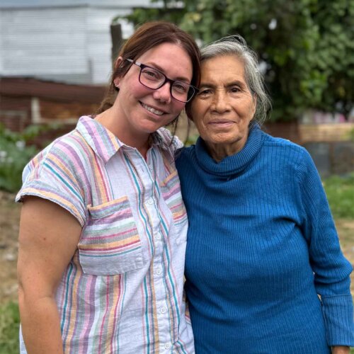 two women reunited on a mission trip