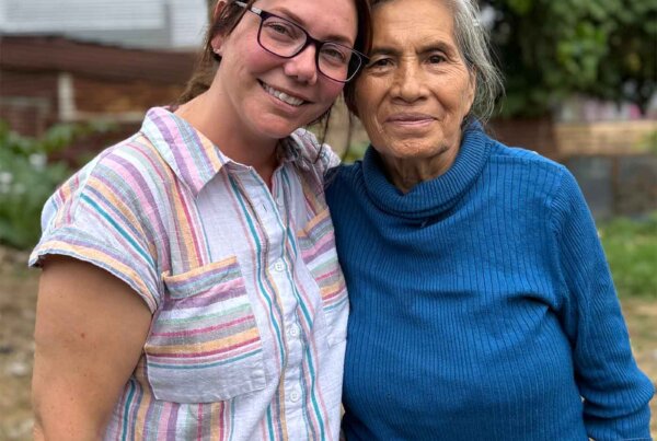 two women reunited on a mission trip