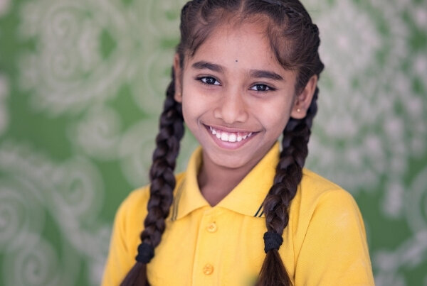 a girl thriving thanks to the feeding program